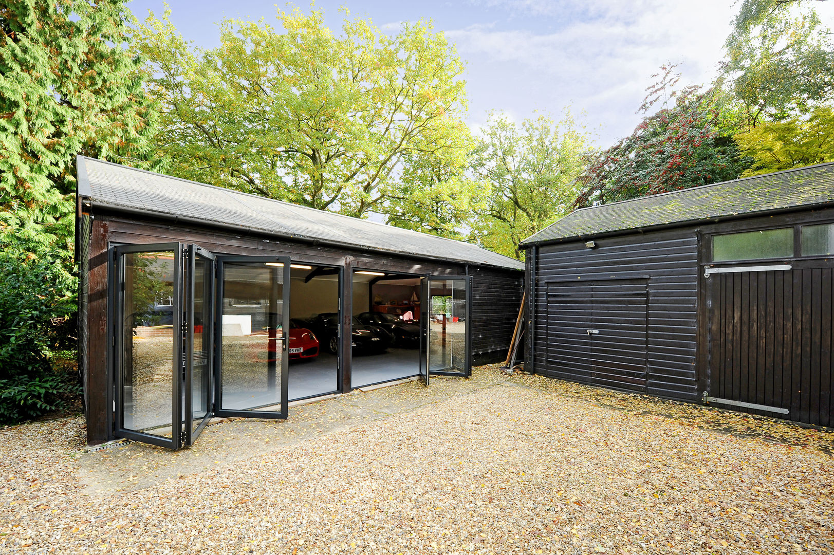 Garage conversion for luxury cars homify Modern garage/shed