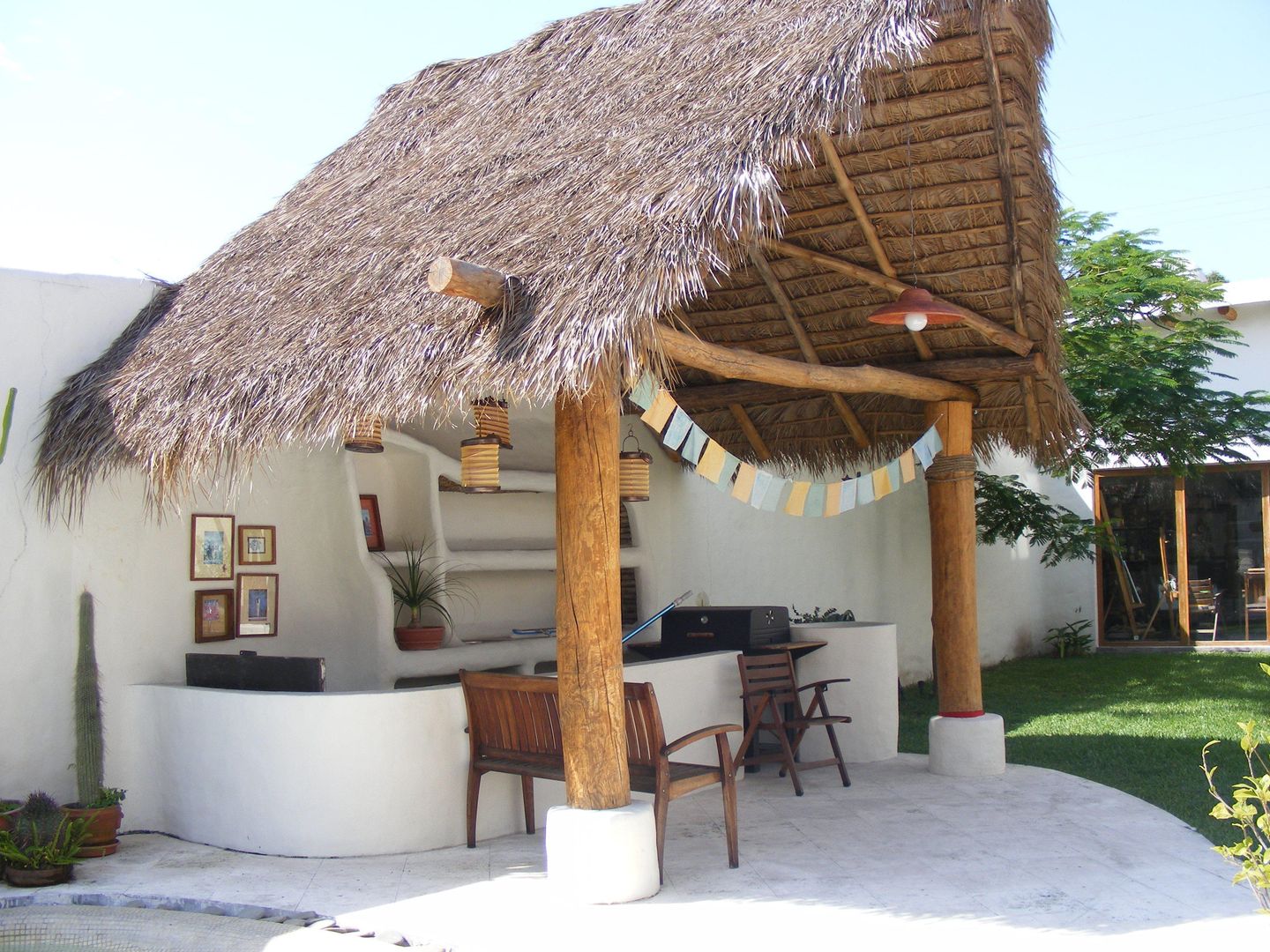 Palapa Cenquizqui Jardines de estilo rústico