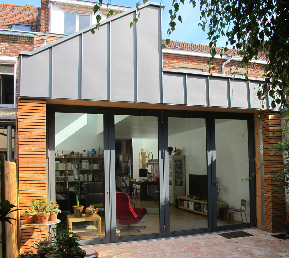 Extension et aménagement d'une maison de ville , F. DEMAGNY ARCHITECTE F. DEMAGNY ARCHITECTE Modern houses