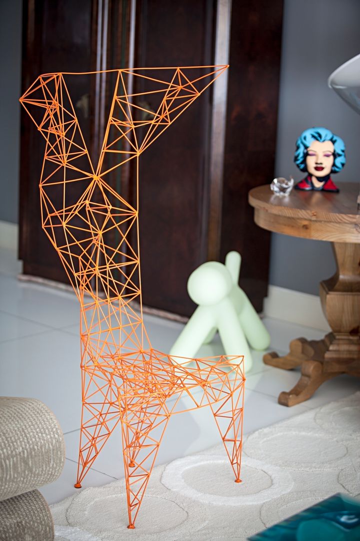 homify モダンデザインの リビング 椅子