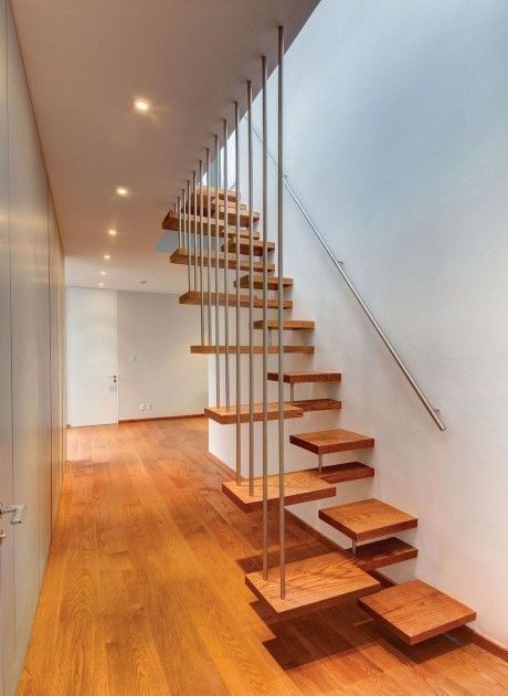 homify Modern Corridor, Hallway and Staircase