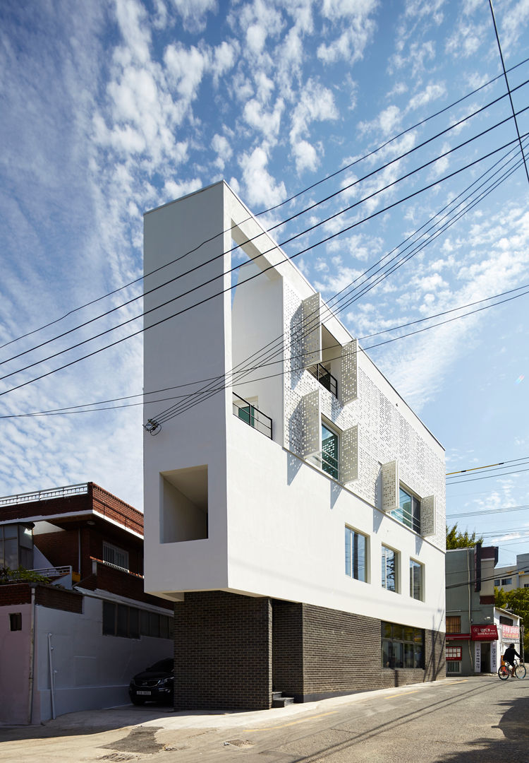 모서리집, 스마트건축사사무소 스마트건축사사무소 Casas estilo moderno: ideas, arquitectura e imágenes