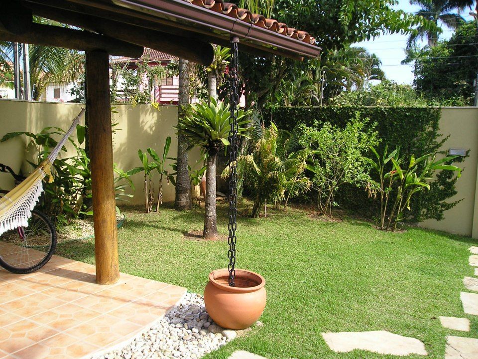 Casa em Juquey, Metamorfose Arquitetura e Urbanismo Metamorfose Arquitetura e Urbanismo Tropical style garden