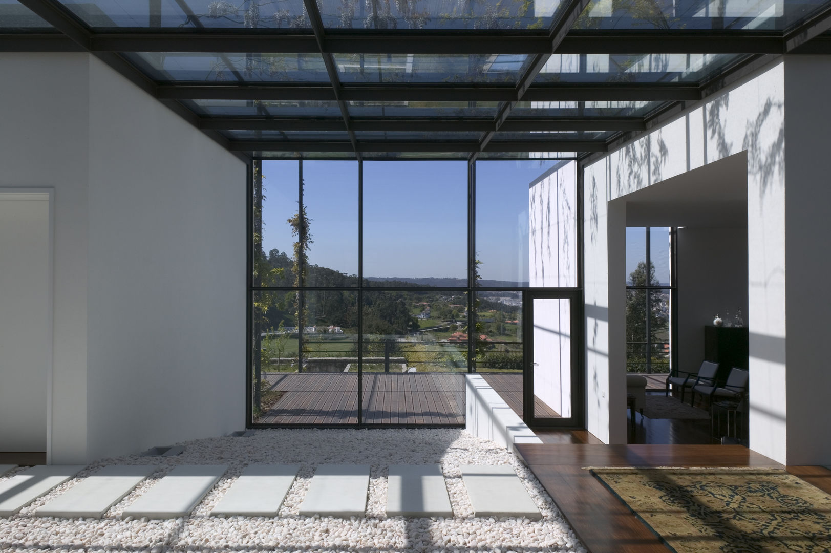 Casa I, A. BURMESTER ARQUITECTOS A. BURMESTER ARQUITECTOS Jardins de Inverno modernos