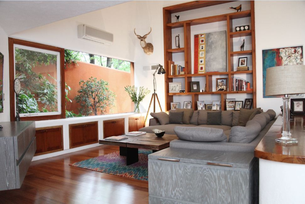 Family Room con mobiliario personalizado Quinto Distrito Arquitectura Salas de entretenimiento de estilo moderno Madera Acabado en madera