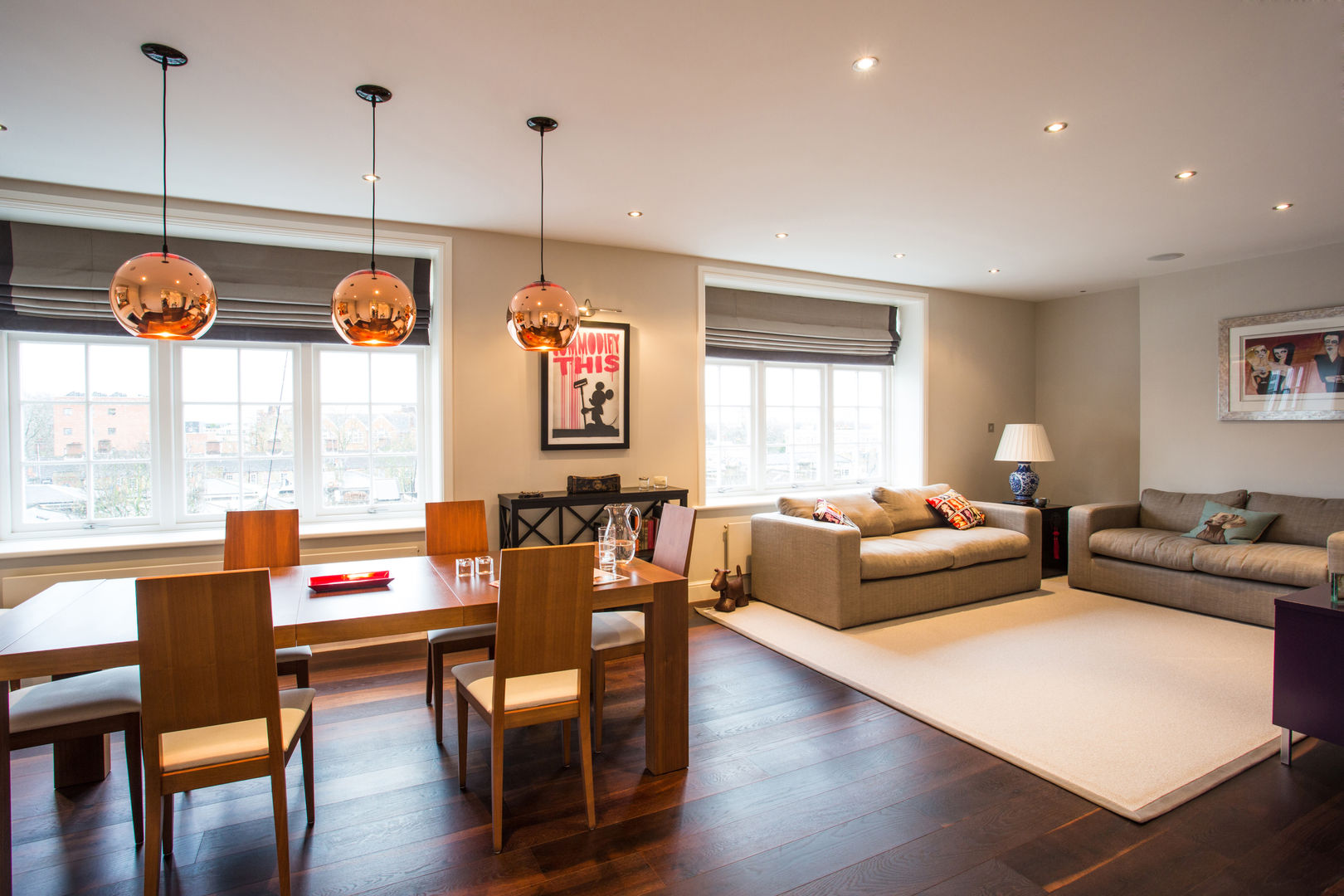 Open plan living and dinning room GK Architects Ltd Salas de estar modernas