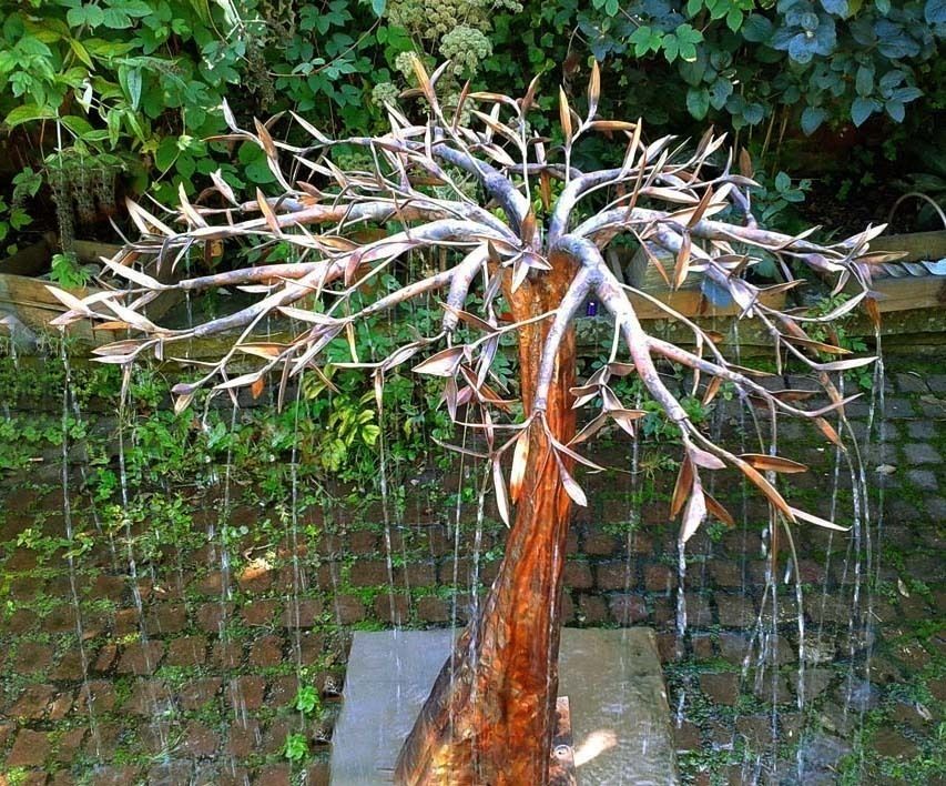 Rain Tree water sculpture homify Jardins rústicos Acessórios e decoração