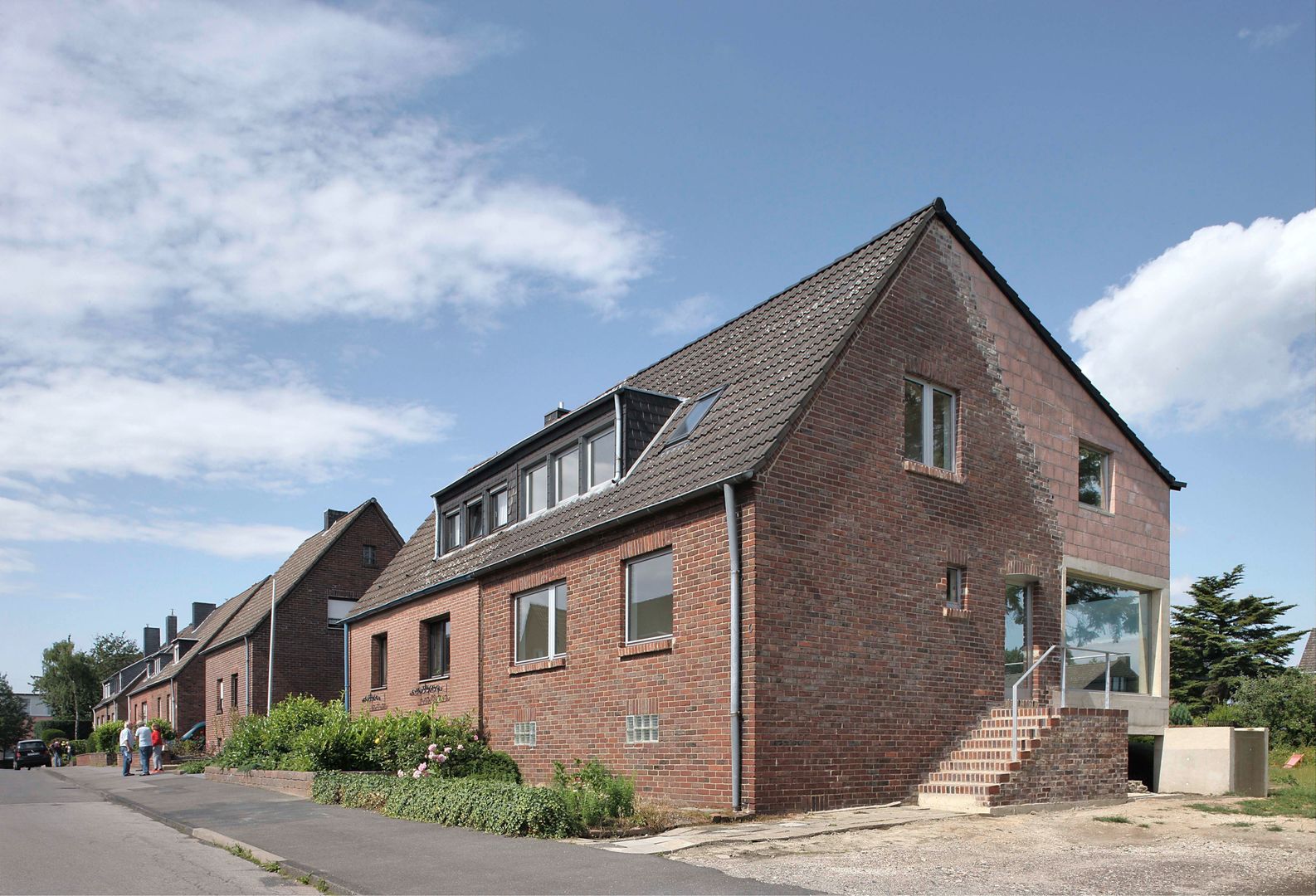 SCHREBER. Neues Wohngefühl in saniertem Siedlungshaus in Aachen , AMUNT Architekten in Stuttgart und Aachen AMUNT Architekten in Stuttgart und Aachen Conjunto residencial