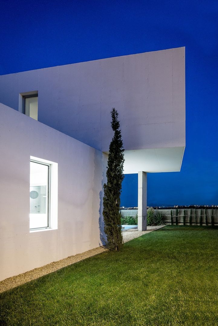 Casa Mikado, Ascoz Arquitectura Ascoz Arquitectura حديقة