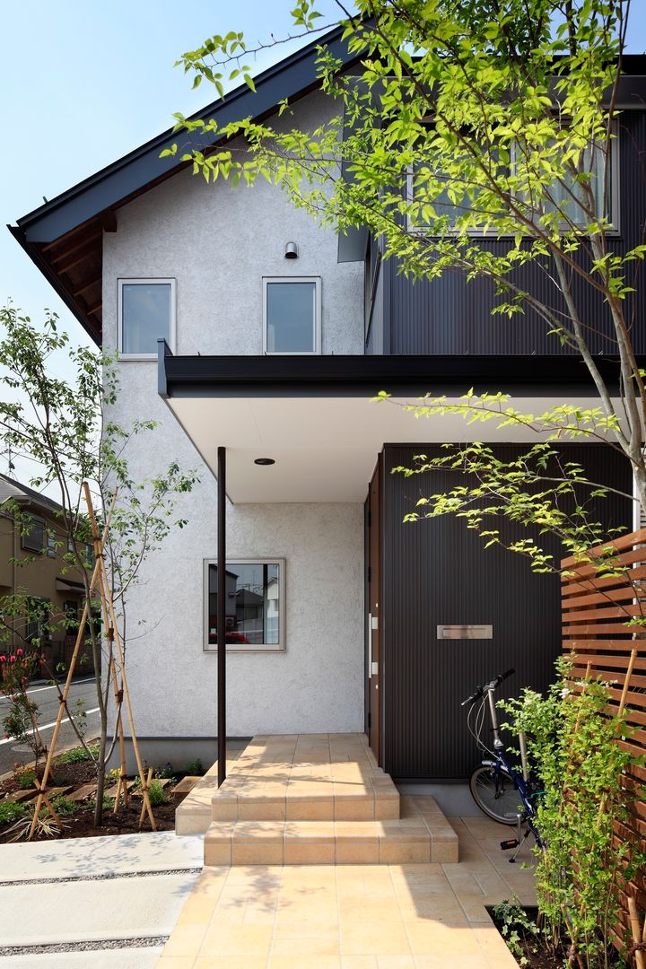 上野毛の家, TAMAI ATELIER TAMAI ATELIER Casas de estilo moderno