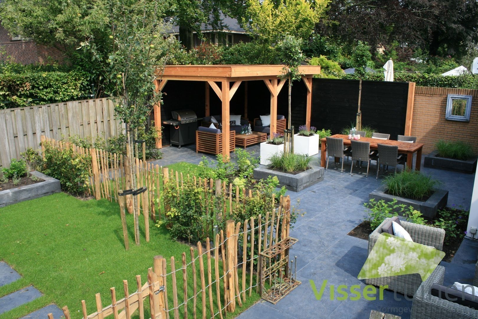 Sfeervolle lounge tuin, Visser Tuinen Visser Tuinen 庭院