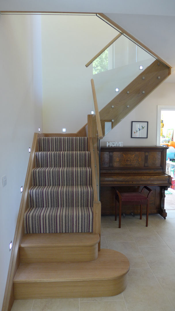 oak staircase Style Within Modern corridor, hallway & stairs striped stair carpet,fitted stair carpet,purple stripe carpet,stair carpet,oak staircase,step lighting,stair lighting,home lighting,glass balustrade,corridor