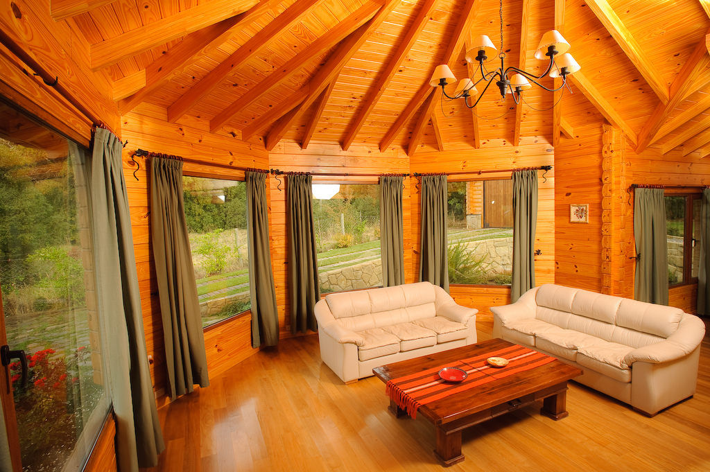 Casa Amancay Ι San Martín de los Andes, Neuquén. Argentina., Patagonia Log Homes - Arquitectos - Neuquén Patagonia Log Homes - Arquitectos - Neuquén Living room Wood Wood effect