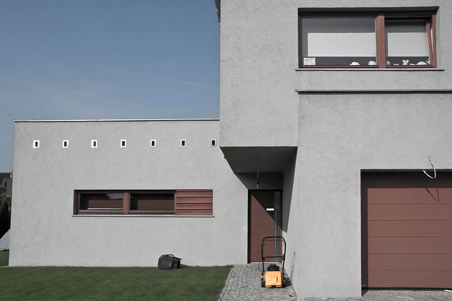 Projekt domu jednorodzinnego - Poznań, Konrad Idaszewski Architekt Konrad Idaszewski Architekt 現代房屋設計點子、靈感 & 圖片