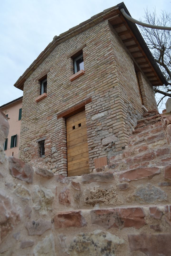 Restauro di un Ex Lanificio, STUDIO TONTI STUDIO TONTI Industrial style houses