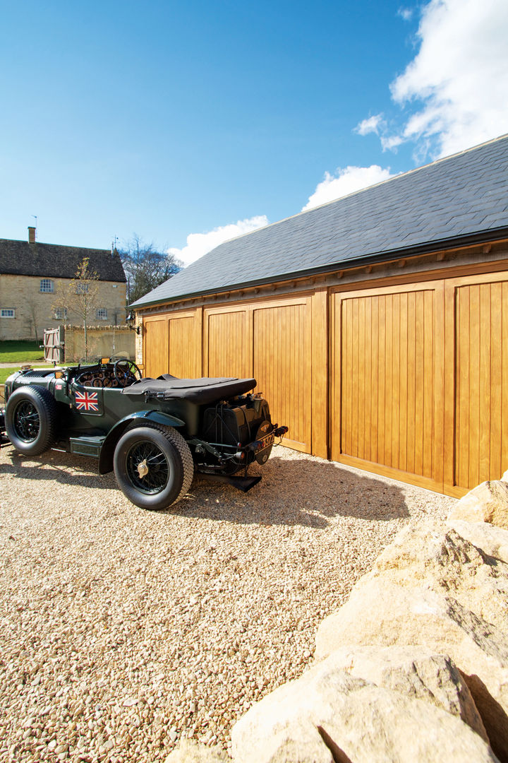 Garage Door made from Timber The Garage Door Centre Limited Scandinavian style garage/shed Garages & sheds