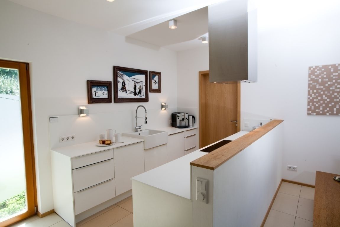 Fertighaus: Wohnen und Arbeiten, RENSCH-HAUS GMBH RENSCH-HAUS GMBH Modern kitchen