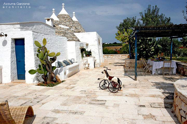 Complesso trulli. Valle d'Itria, Azzurra Garzone architetto Azzurra Garzone architetto Mediterranean style garden