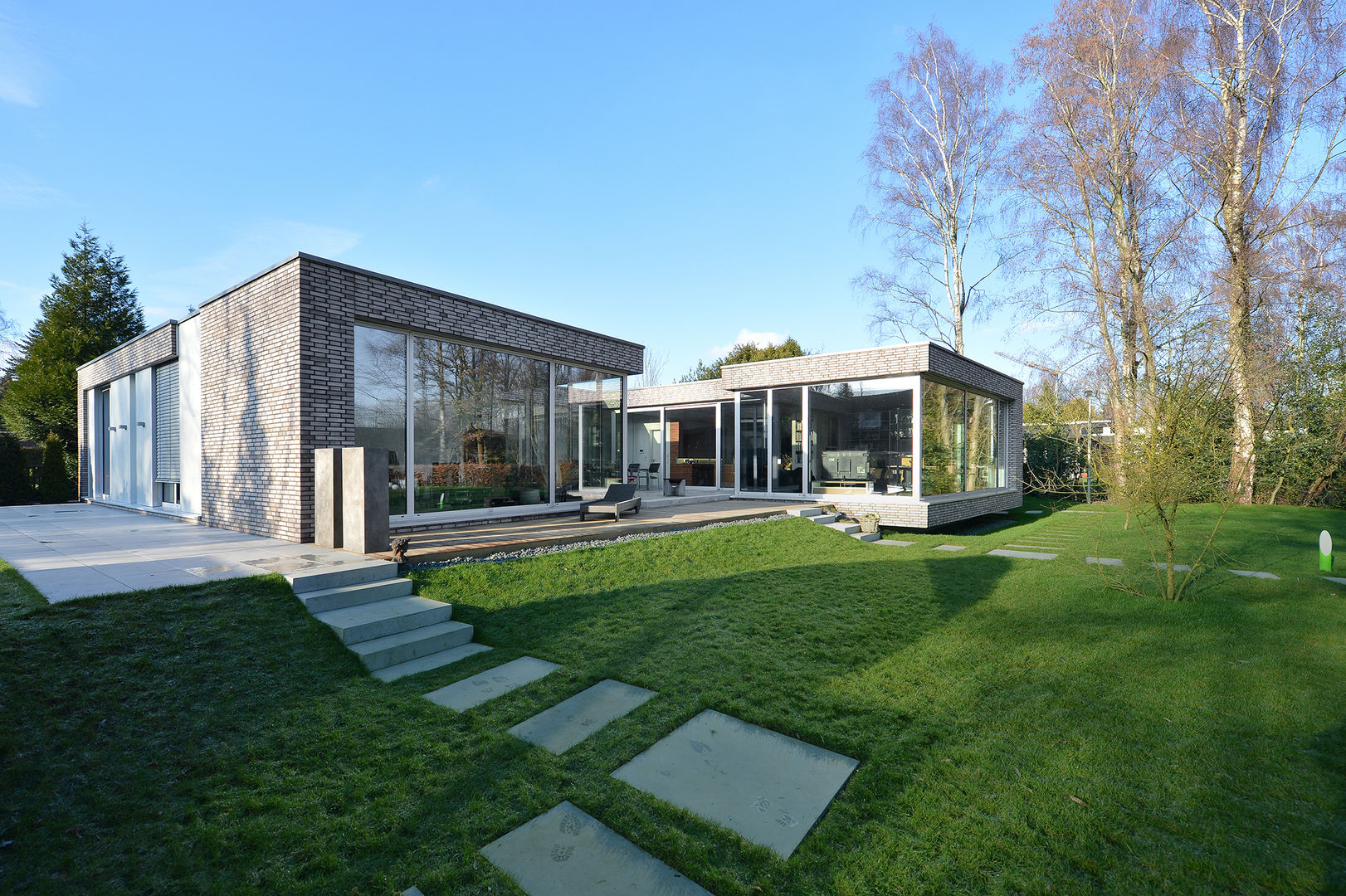 Das Atriumhaus, Architekten Spiekermann Architekten Spiekermann Casas modernas