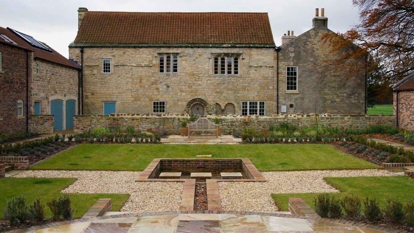 Medieval Barn and Courtyard view Wildblood Macdonald Houses