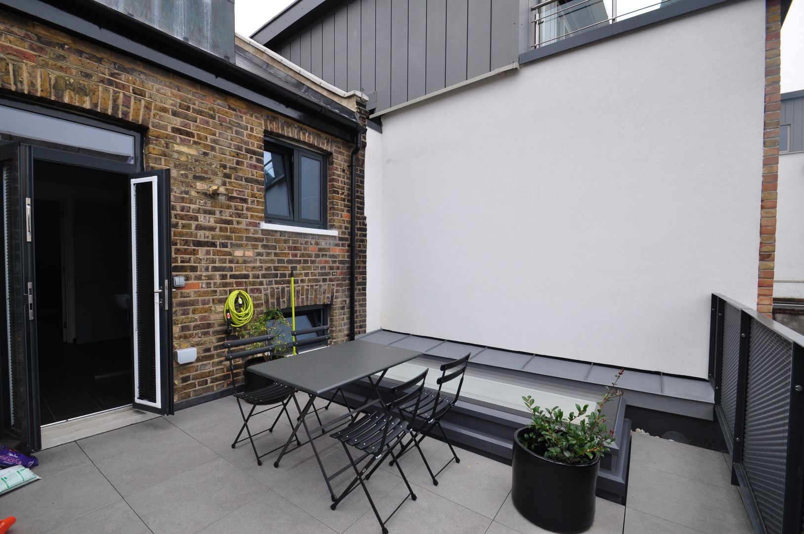 KINGSLAND ROAD E2 Architecture + Interiors Modern balcony, veranda & terrace