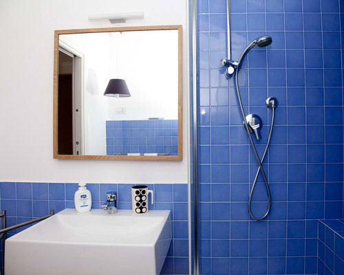 loft a milano, archiexpress archiexpress Phòng tắm phong cách kinh điển