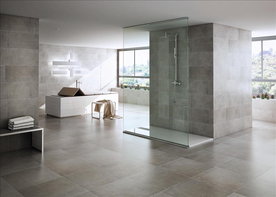 Cementos y metales en azulejos y pavimentos, INTERAZULEJO INTERAZULEJO Phòng tắm phong cách tối giản