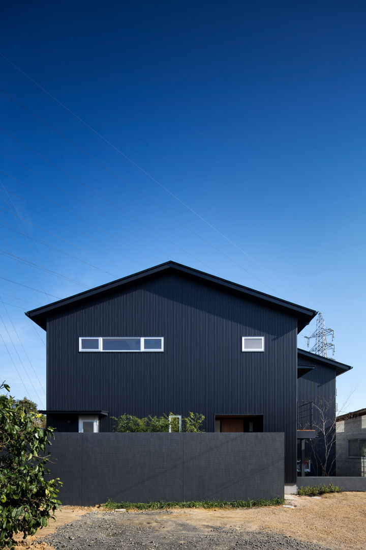 家族をつなぐスキップフロアの家－外観１－ 小田達郎建築設計室 モダンな 家