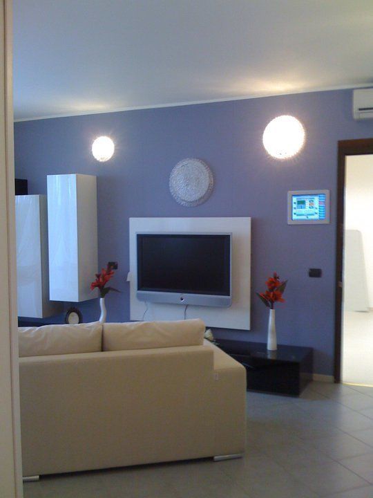 APPARTAMENTO TIPO "ALESSANDRIA 2000", MARA GAGLIARDI "INTERIOR DESIGNER" MARA GAGLIARDI 'INTERIOR DESIGNER' Modern living room Lighting