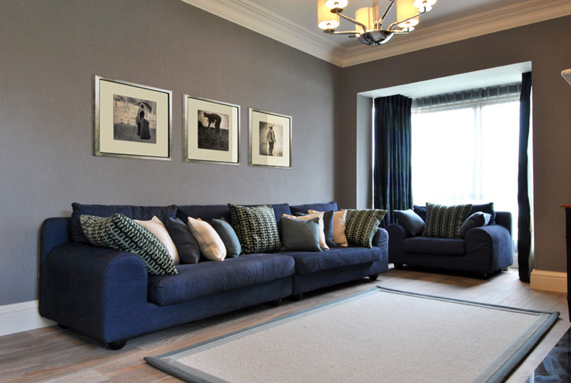 Family Living Room CLAIRE HAMMOND INTERIORS Salas de estilo clásico Sofás y sillones