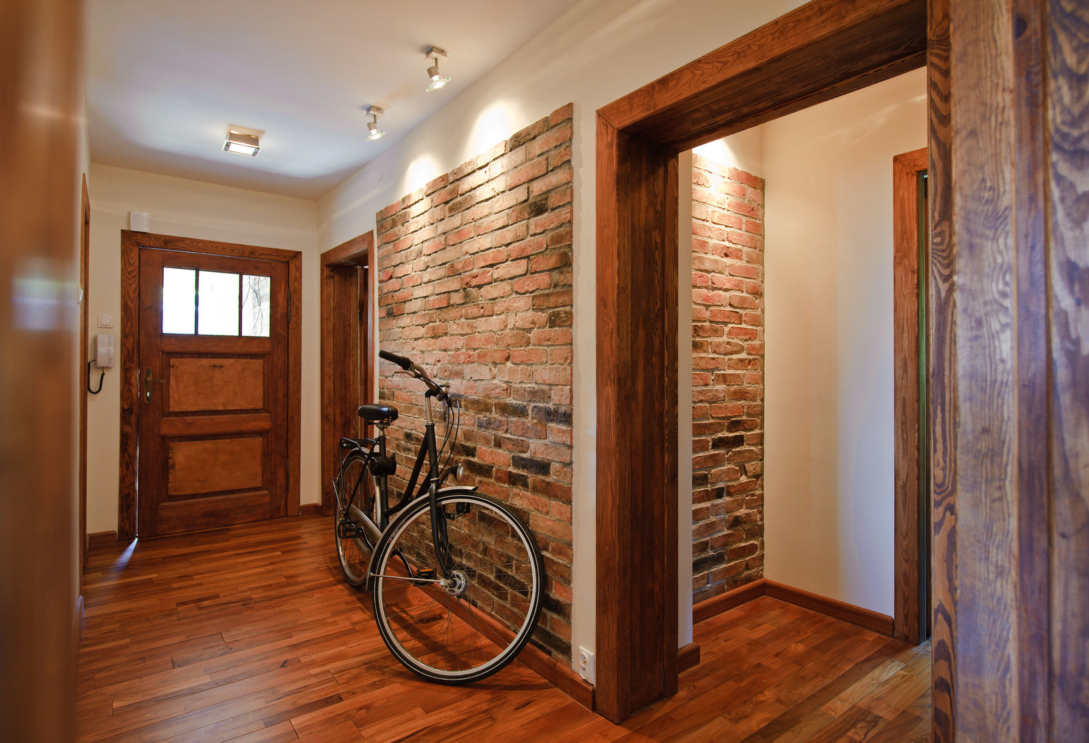 homify Rustic style corridor, hallway & stairs