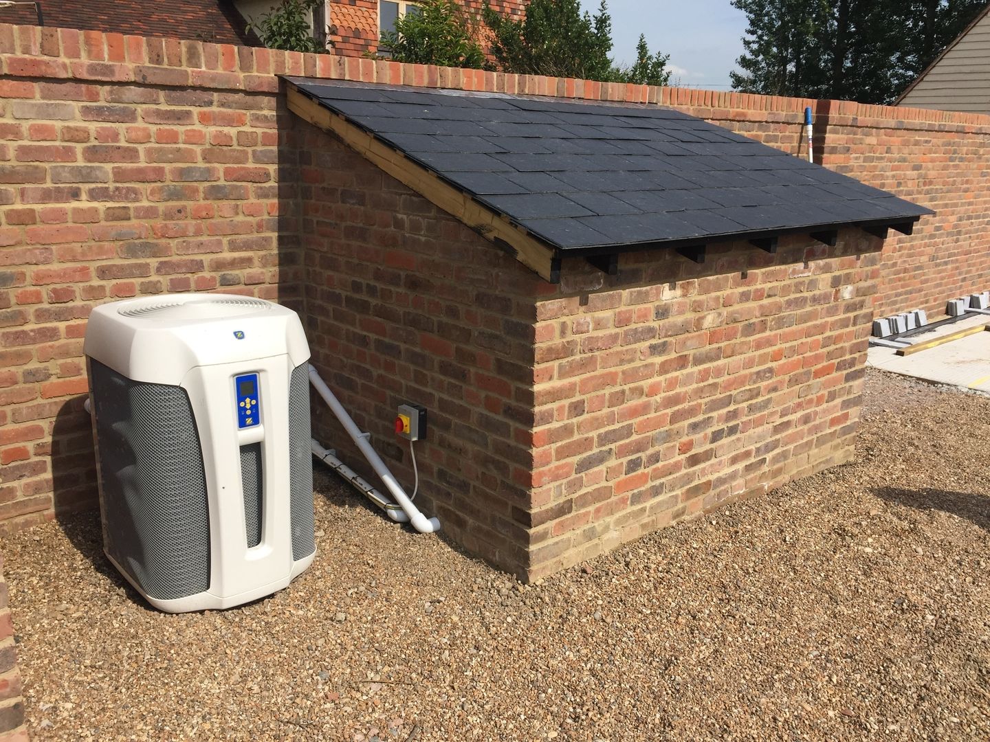 Pool house and Air Source Heat Pump XL Pools Ltd