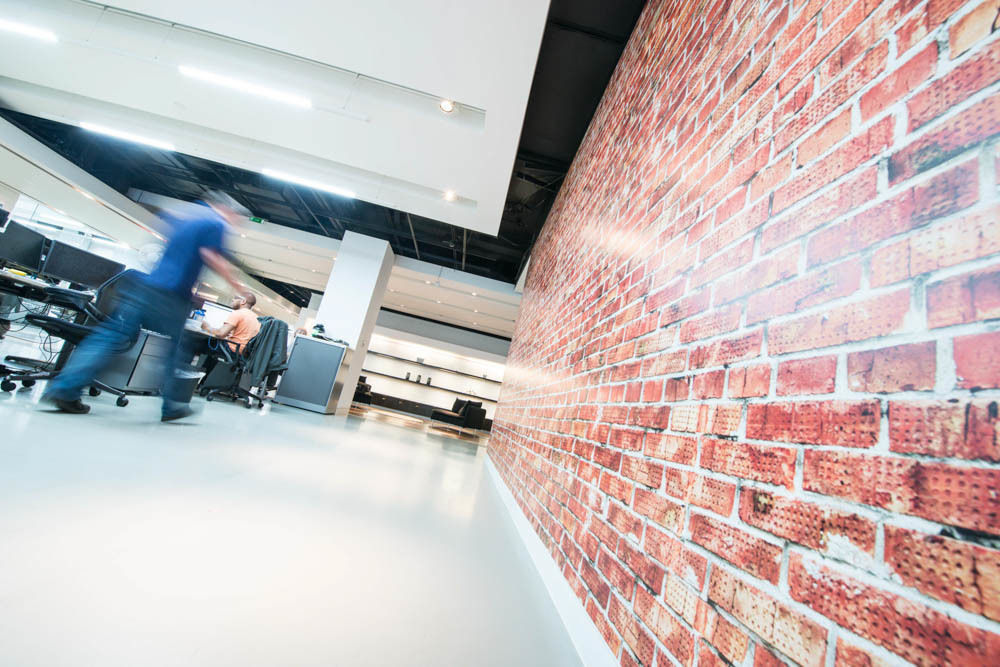 Exposed brick vinyl wall mural graphic Vinyl Impression Espaces commerciaux Bureaux