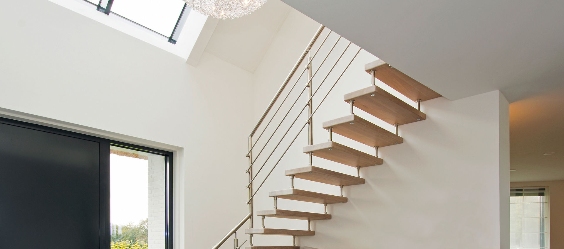 homify Modern corridor, hallway & stairs