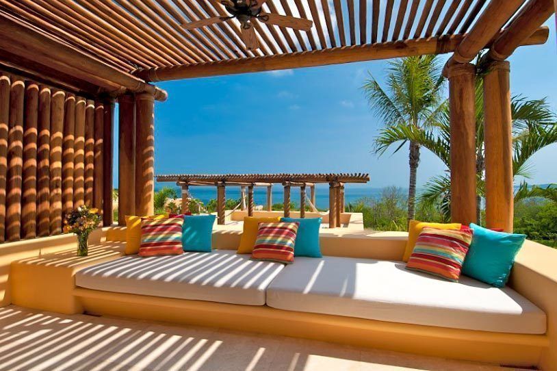 Kupuri BR ARQUITECTOS Balcones y terrazas de estilo tropical