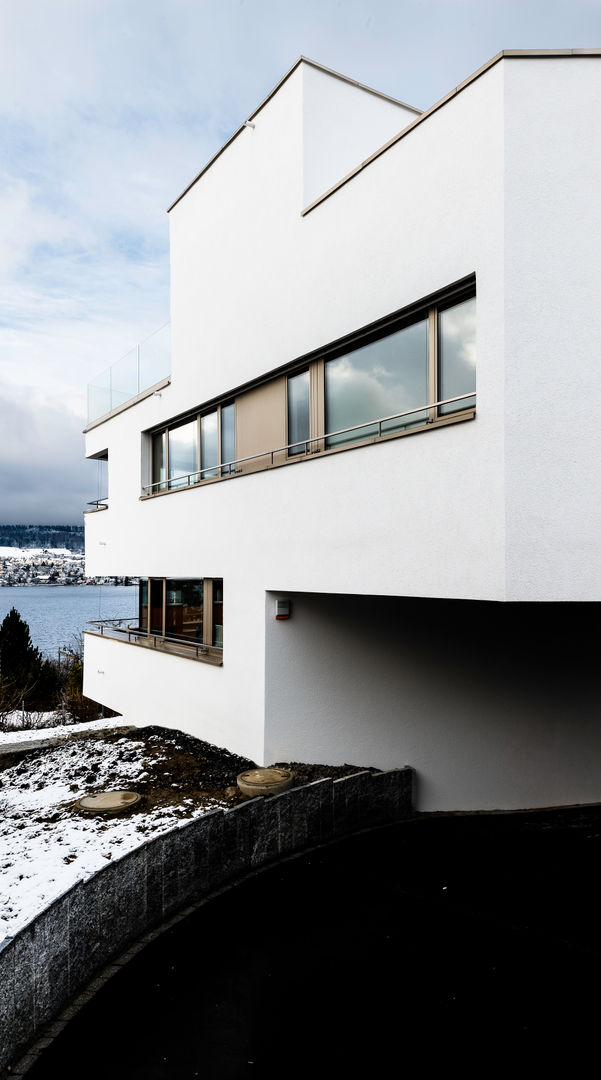 Mehrfamilienhaus 'Flair' in Herrliberg, AMZ Architekten AG sia fsai AMZ Architekten AG sia fsai Casas multifamiliares