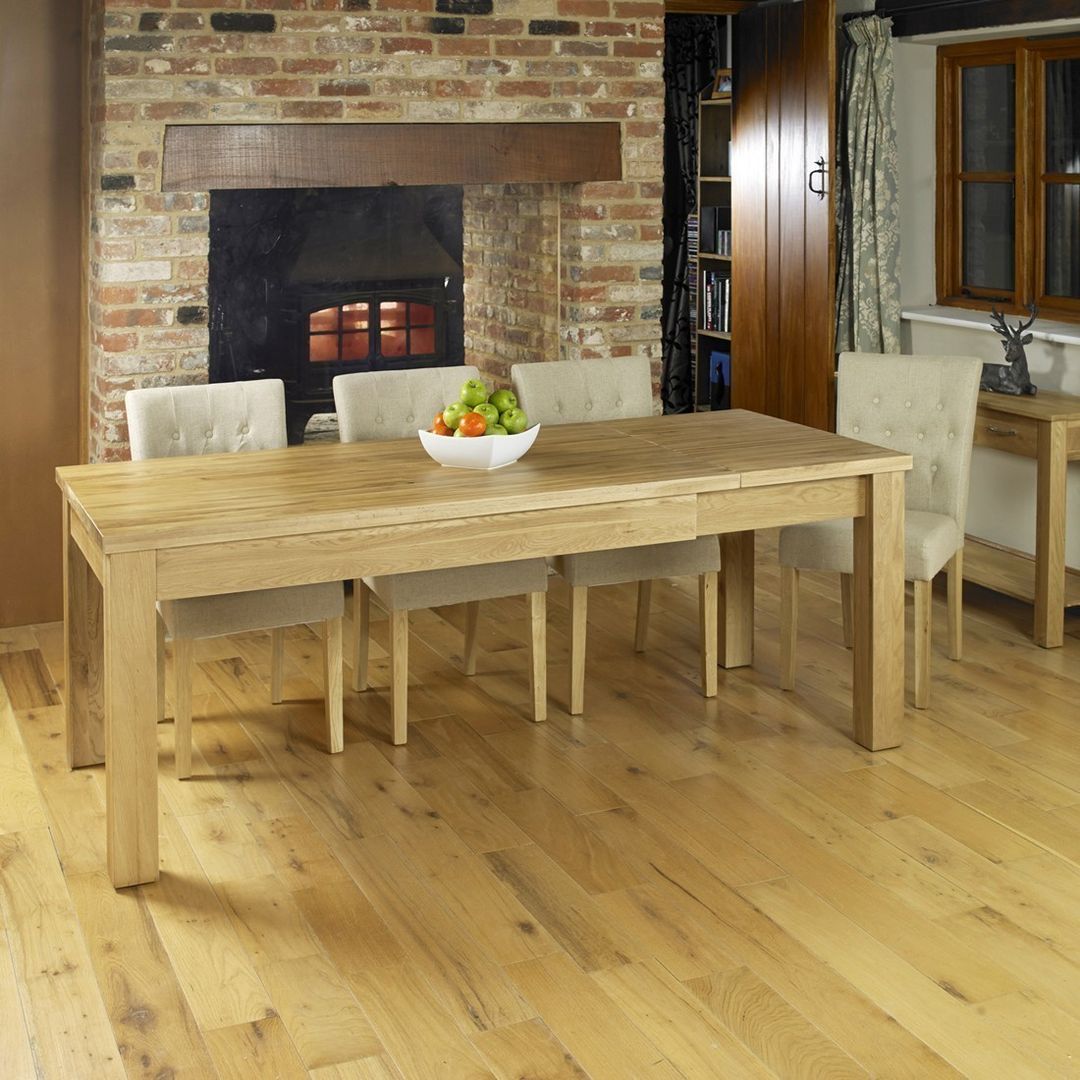 Bonsoni Extending Oak Dining Table (Seats 4-8. Chairs not included) homify Столовая комната в стиле лофт Стулья и скамьи