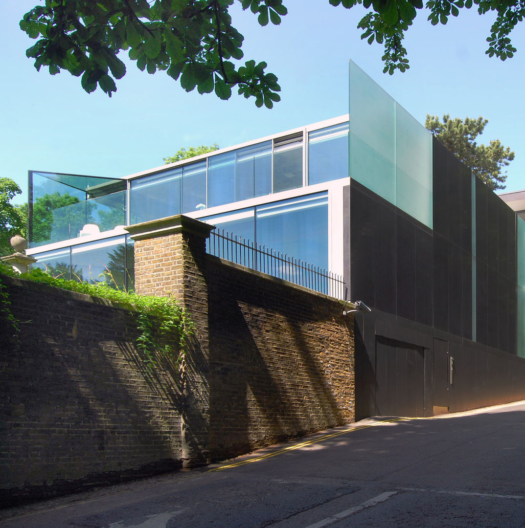 Granite facade to street Eldridge London Minimalist house Stone