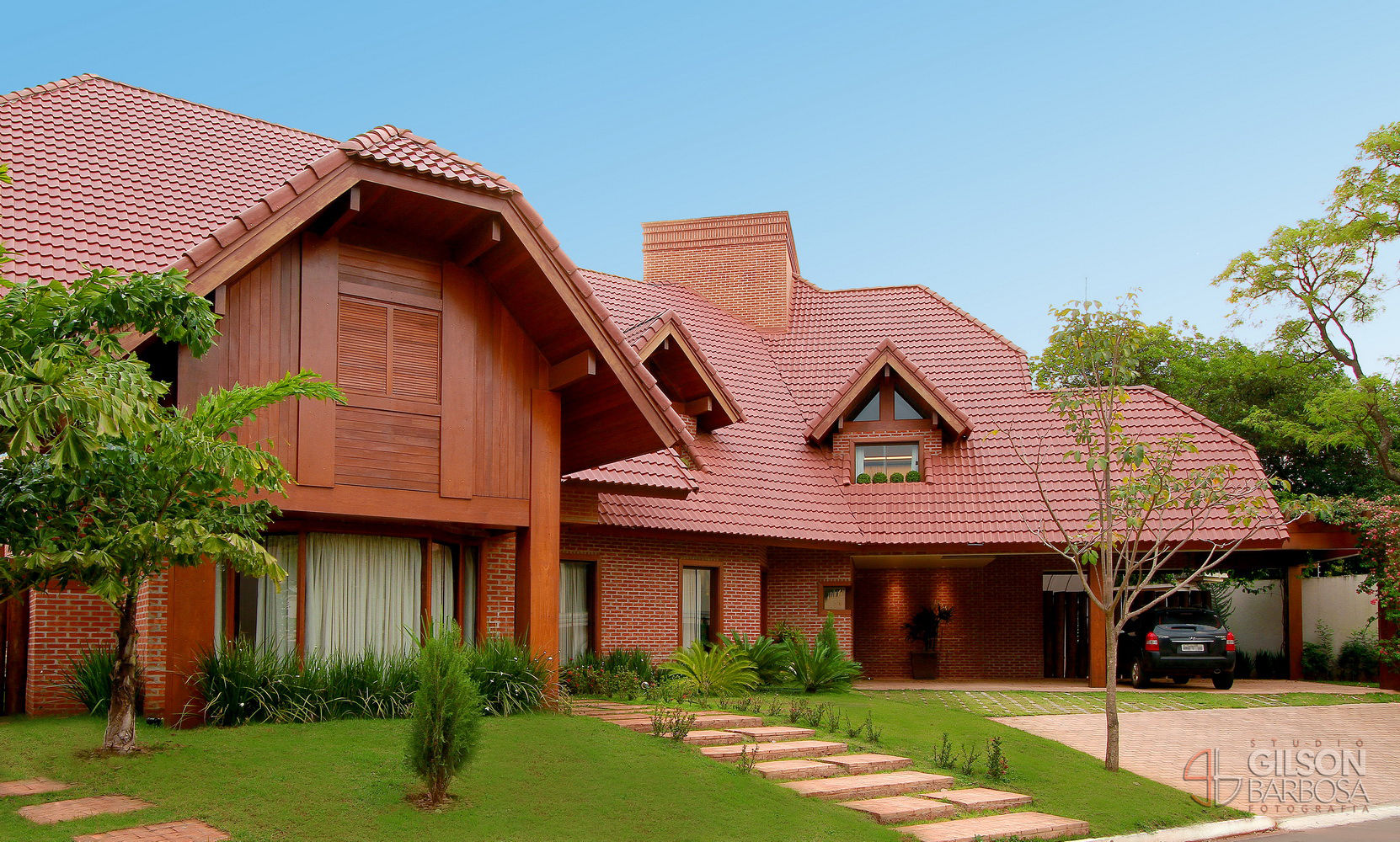 A força de um estilo., PAULO DELMONDES ARQUITETURA PAULO DELMONDES ARQUITETURA Rustic style houses