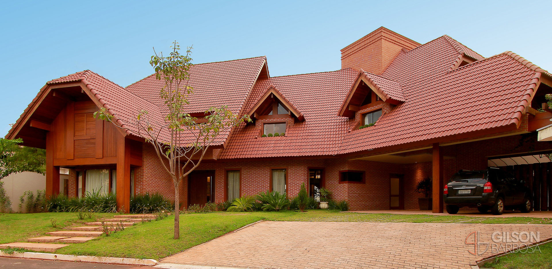 A força de um estilo., PAULO DELMONDES ARQUITETURA PAULO DELMONDES ARQUITETURA Rustic style houses