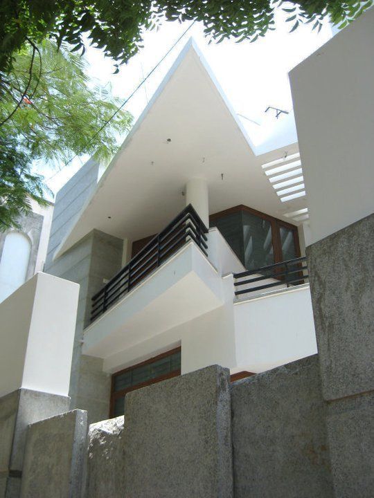 ARUNAGIRI RESIDENCE, Muraliarchitects Muraliarchitects Modern houses