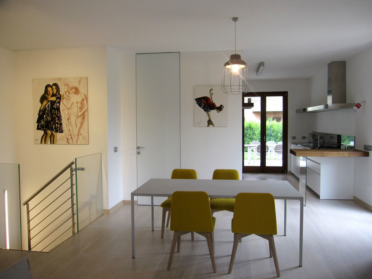 casa a Loreto (progetto di distribuzione e interior design), Laura Canonico Architetto Laura Canonico Architetto Comedores de estilo minimalista