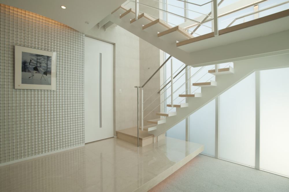 homify Modern corridor, hallway & stairs