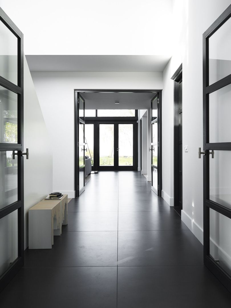 homify Modern corridor, hallway & stairs