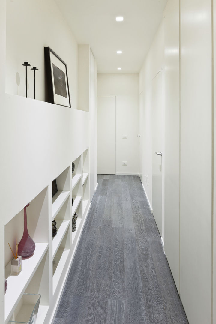 Appartamento a Bollate, bdastudio bdastudio Corredores, halls e escadas minimalistas