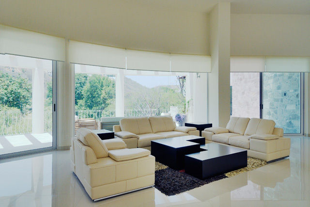RESIDENCIA LOPEZ, Excelencia en Diseño Excelencia en Diseño Modern living room