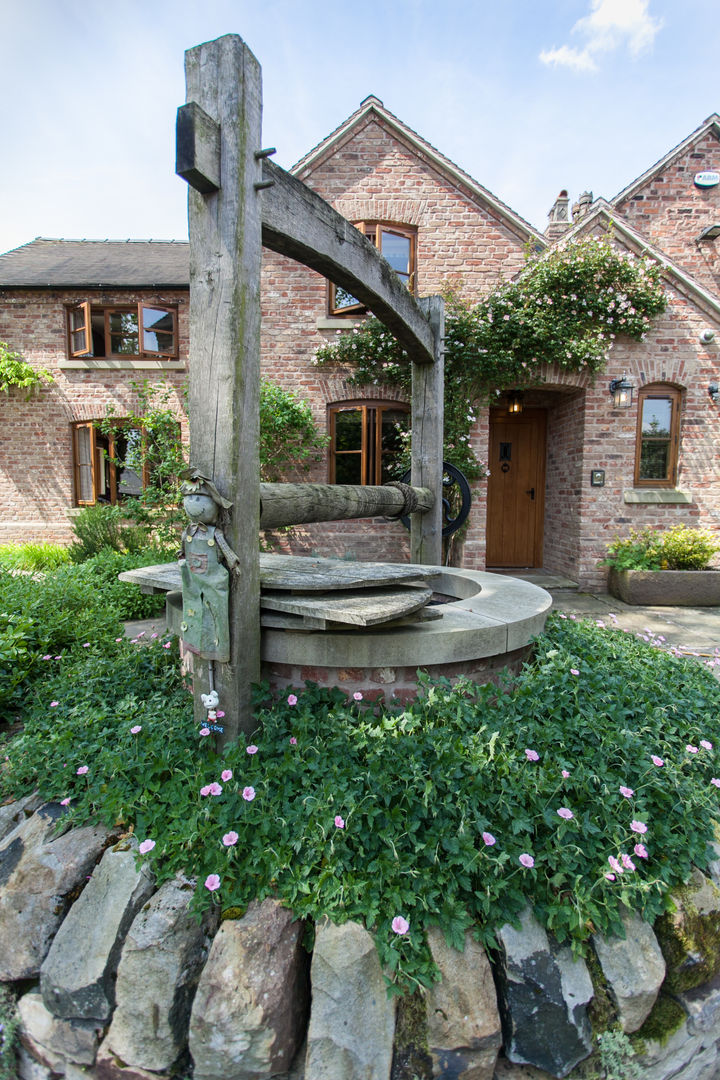 Well Barnes Walker Ltd Rustic style garden