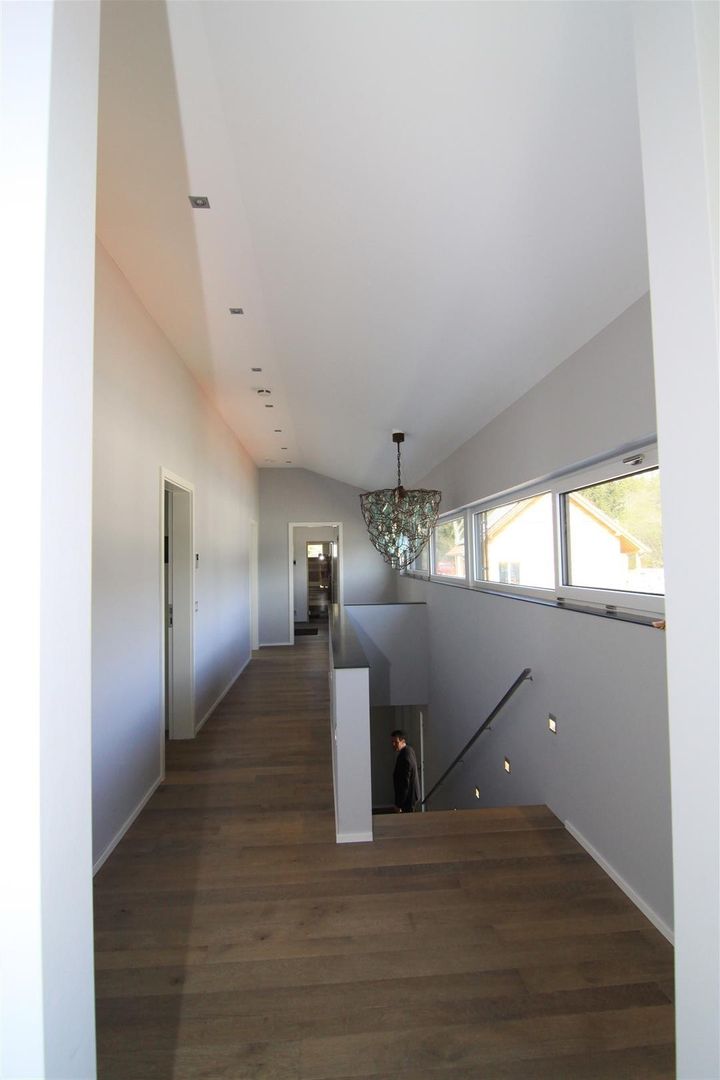 Plusenergiehaus, Architekturbüro Ketterer Architekturbüro Ketterer Modern Corridor, Hallway and Staircase