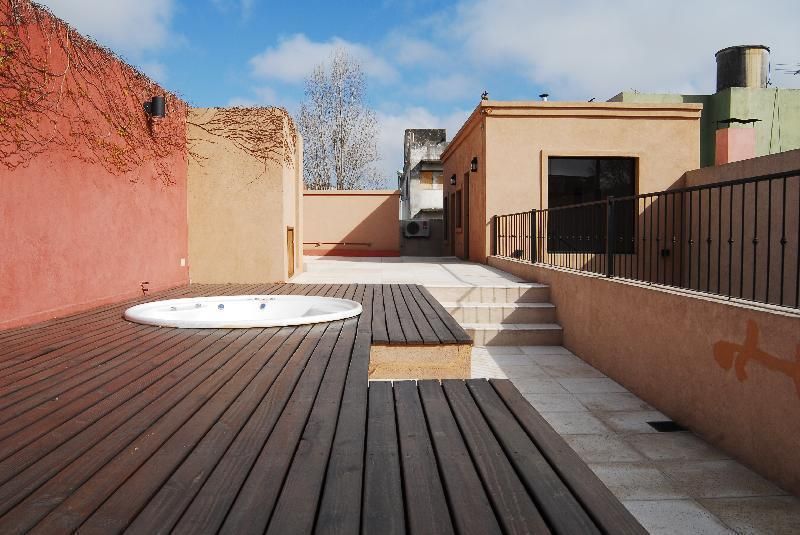 terraza Spa, después Parrado Arquitectura Balcones y terrazas de estilo ecléctico