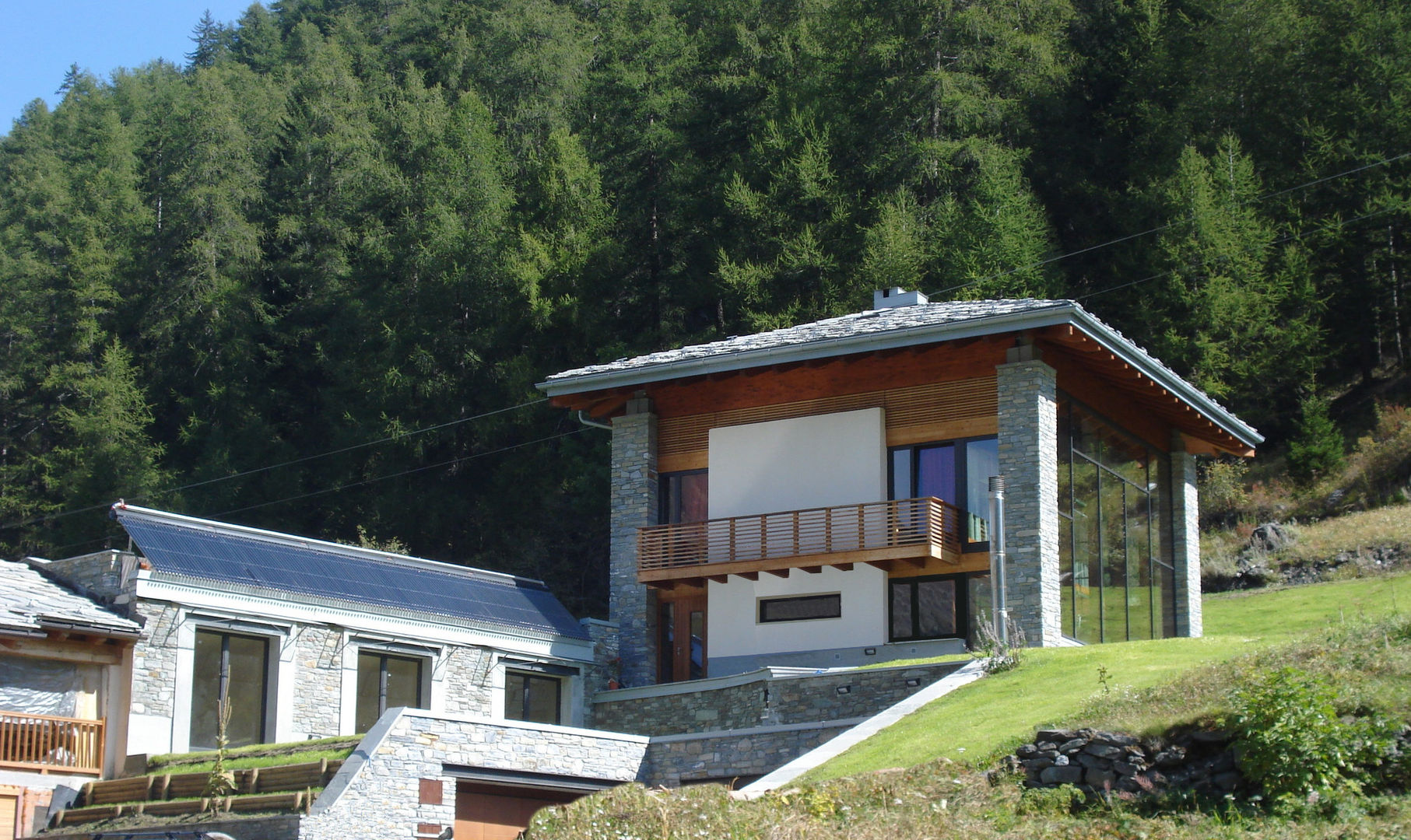 Villa a La Thuile (AO) con serra solare e b&b ipogeo, Eddy Cretaz Architetttura Eddy Cretaz Architetttura Casas modernas